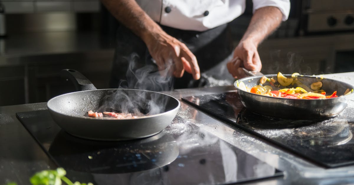 a chef skillfully prepares a meal with fresh ingredients on an electric stove emphasizing culinary