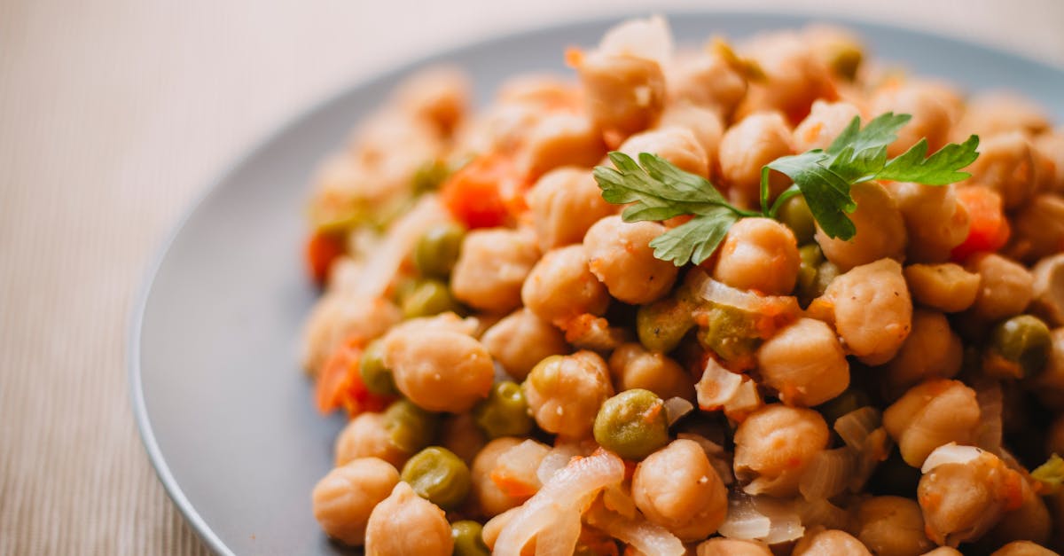 a close up of a nutritious chickpea and vegetable salad on a plate perfect for healthy eating 3