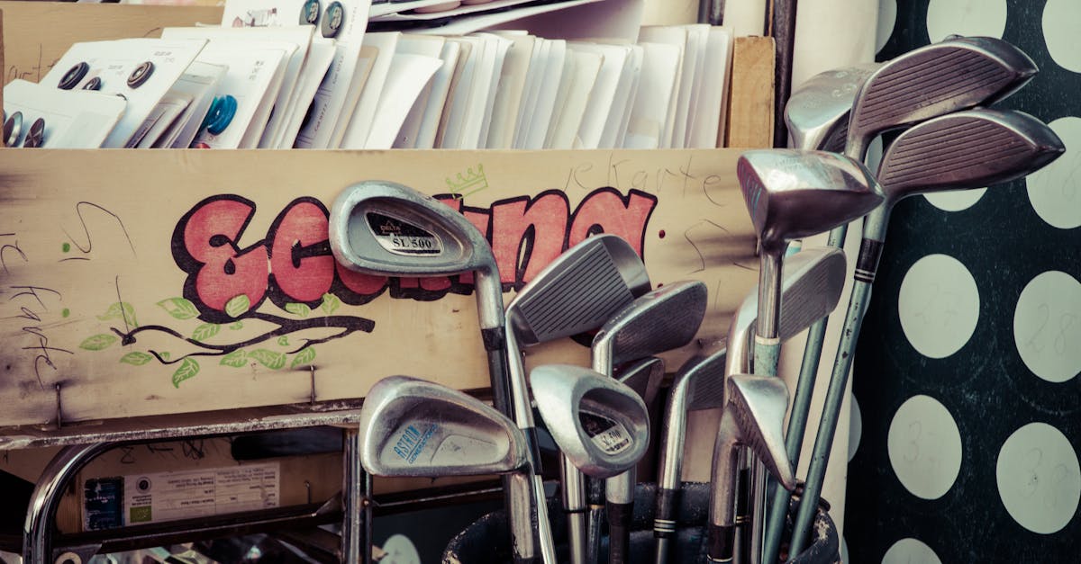 a collection of vintage golf clubs displayed in a flea market setting with retro decor