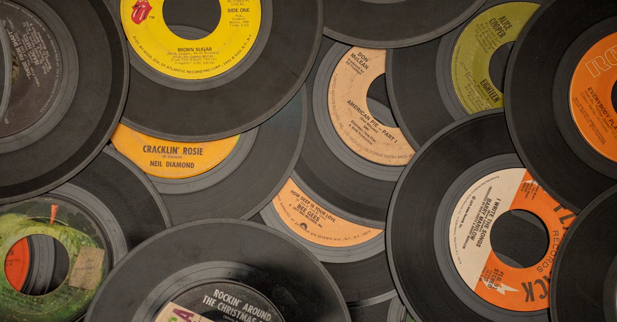 a collection of vintage vinyl records showcasing iconic music labels and artists