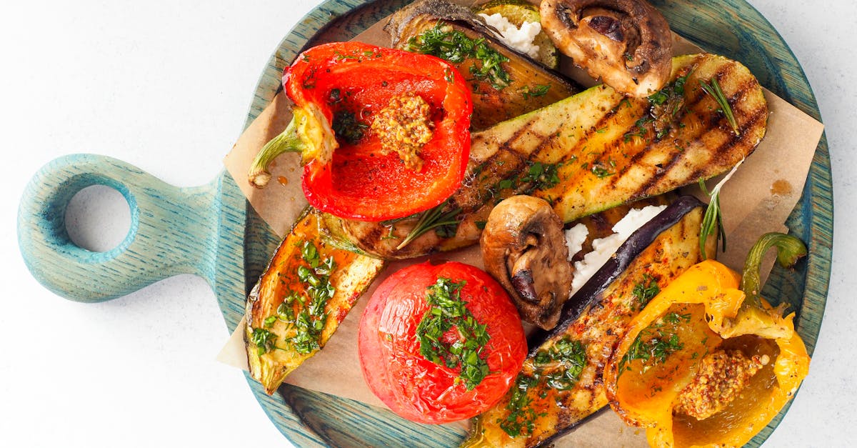 a colorful assortment of grilled vegetables on a wooden board captured from above 1