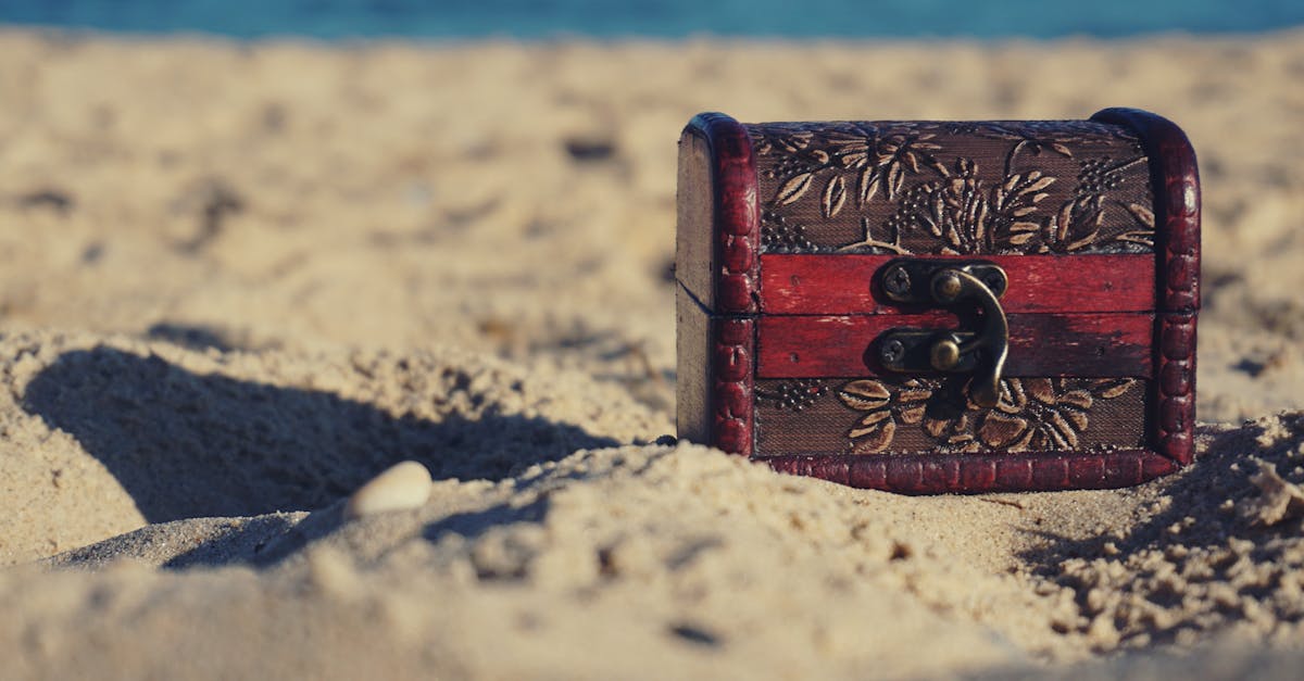 a decorative treasure chest sits on a sunny beach invoking mystery and adventure