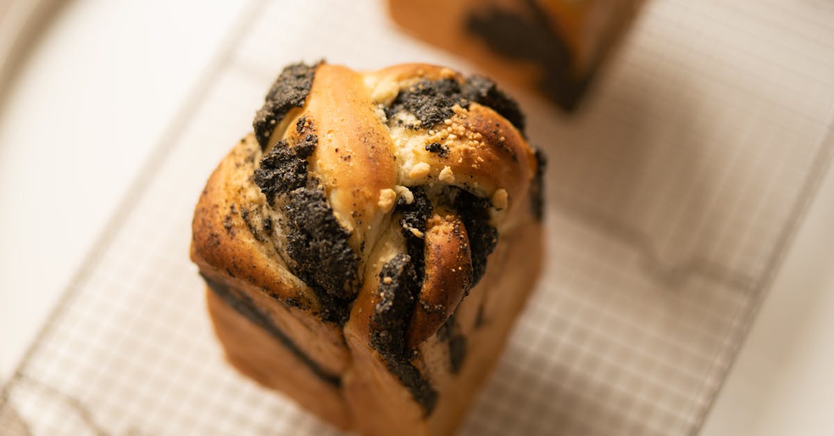 a delicious homemade chocolate swirl babka cooling on a wire rack ready to eat