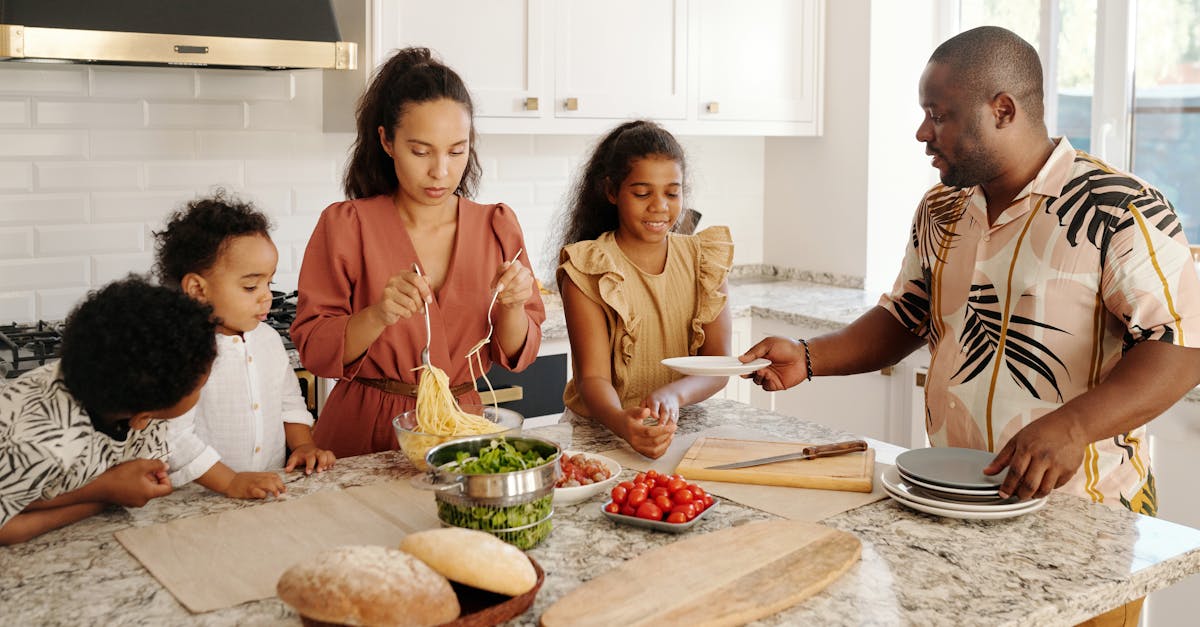 Home a diverse family preparing a meal together in a bright modern kitchen setting 1