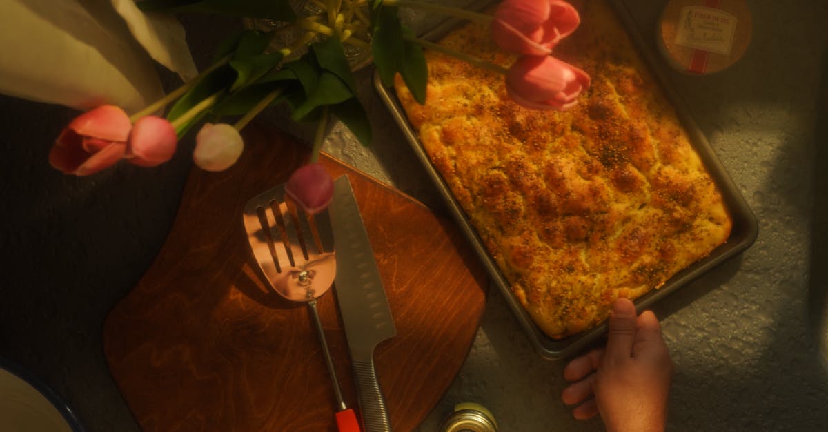 a freshly baked peach cobbler in a cozy kitchen with flowers and utensils 3
