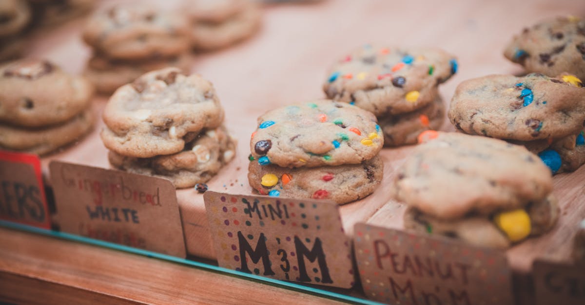 a mouth watering close up of assorted cookies displayed with colorful labels