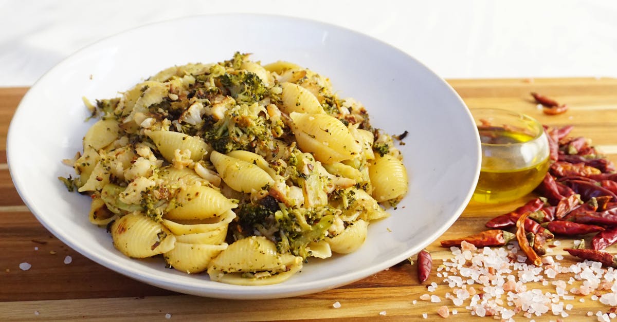 a mouth watering shell pasta dish with broccoli herbs and spices perfect for a healthy dinner