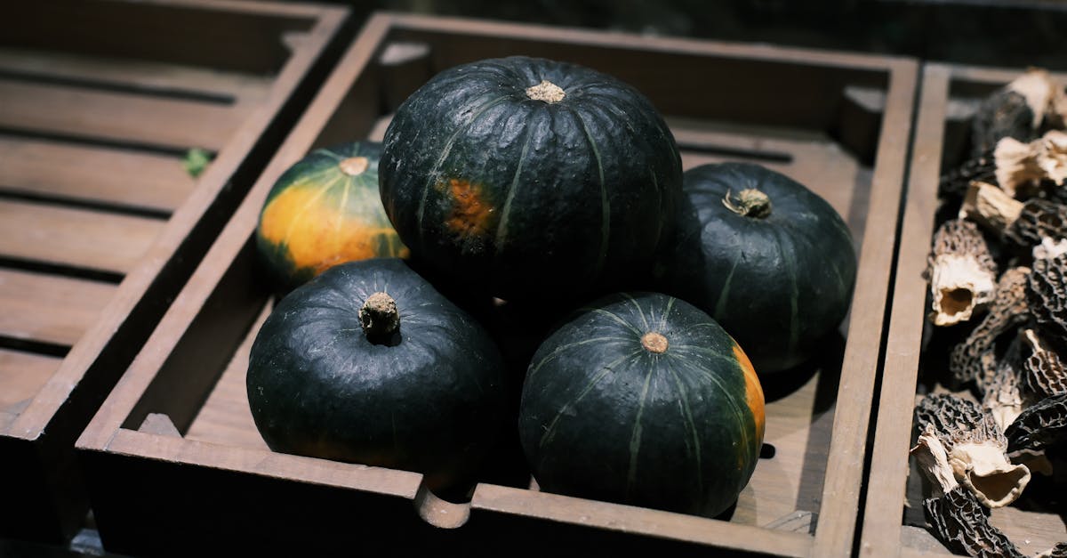 a rustic wooden box filled with fresh kabocha squash ideal for autumn cuisine 3