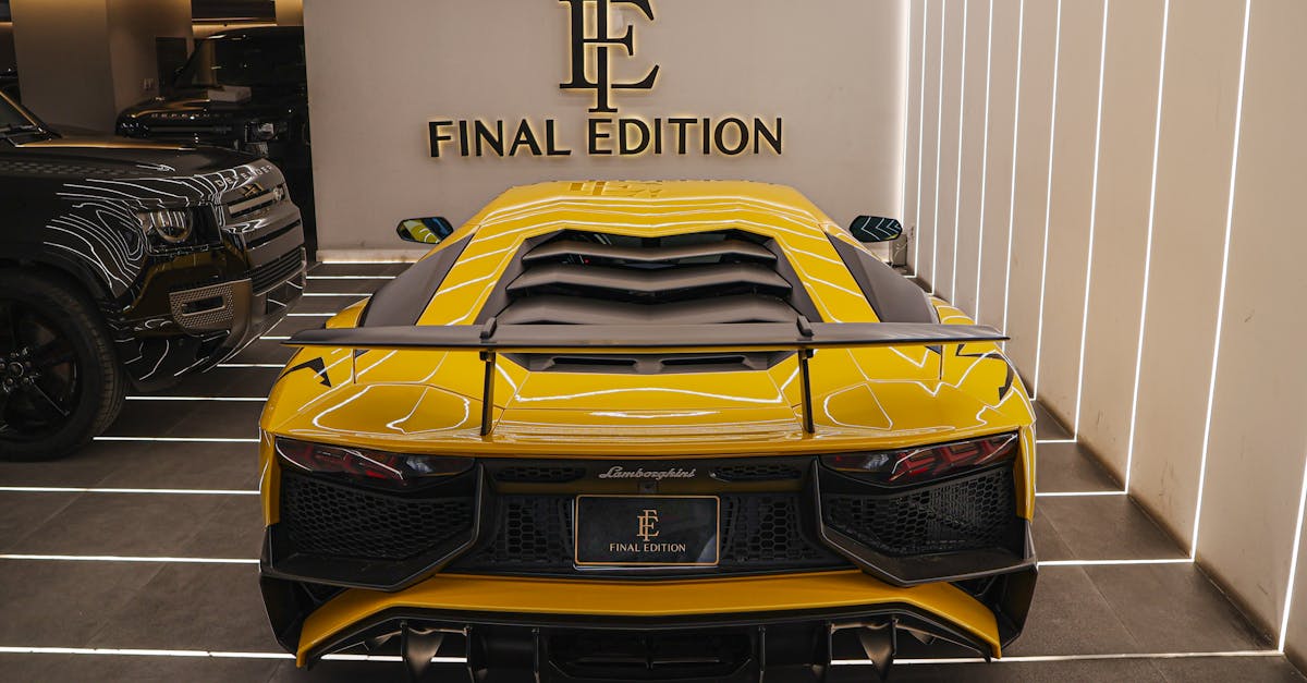 a sleek yellow lamborghini featured in a luxury showroom with sophisticated lighting