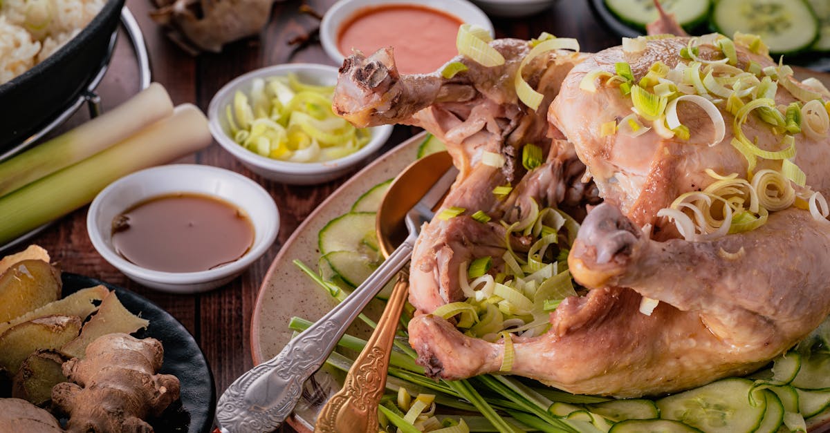 a succulent roast chicken with fresh herbs cucumber and sauces on a decorative plate 1