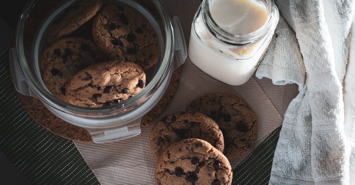a tempting overhead view of chocolate chip cookies and a glass of milk
