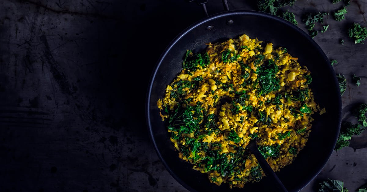 a vibrant and healthy kale stir fry dish in a frying pan with bold colors and