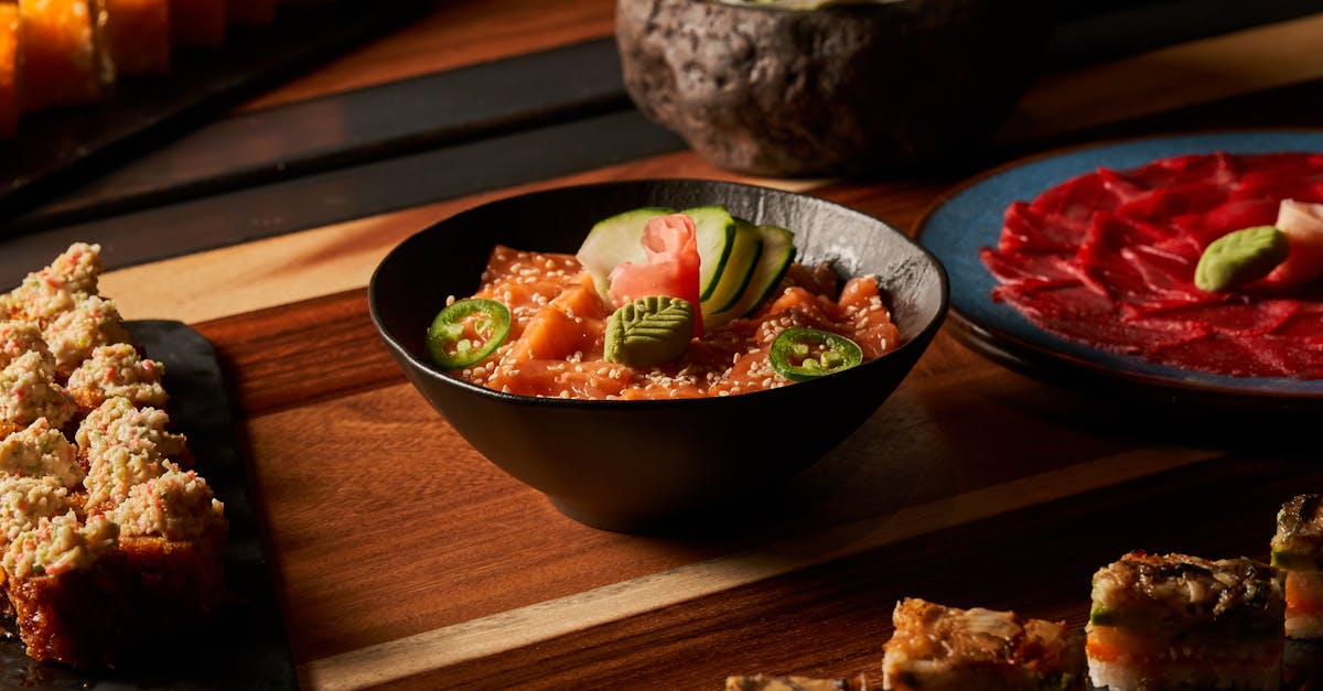 a vibrant assortment of japanese sushi dishes including salmon poke bowl and assorted rolls