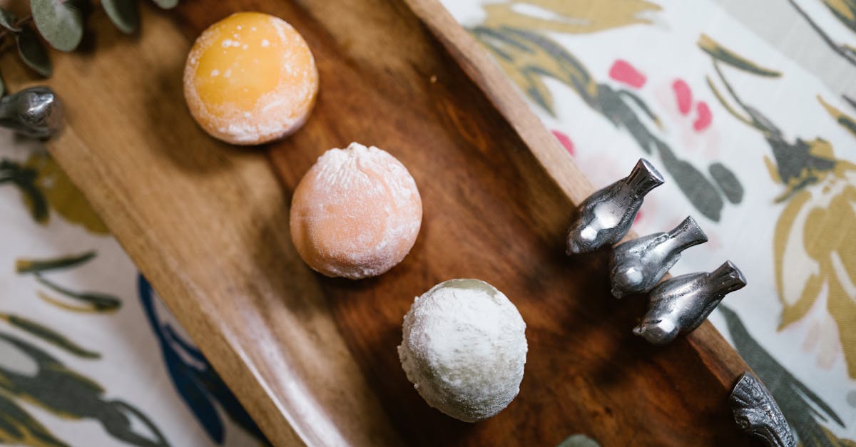 a vibrant assortment of mochi desserts elegantly presented on a wooden tray perfect for food photog 1