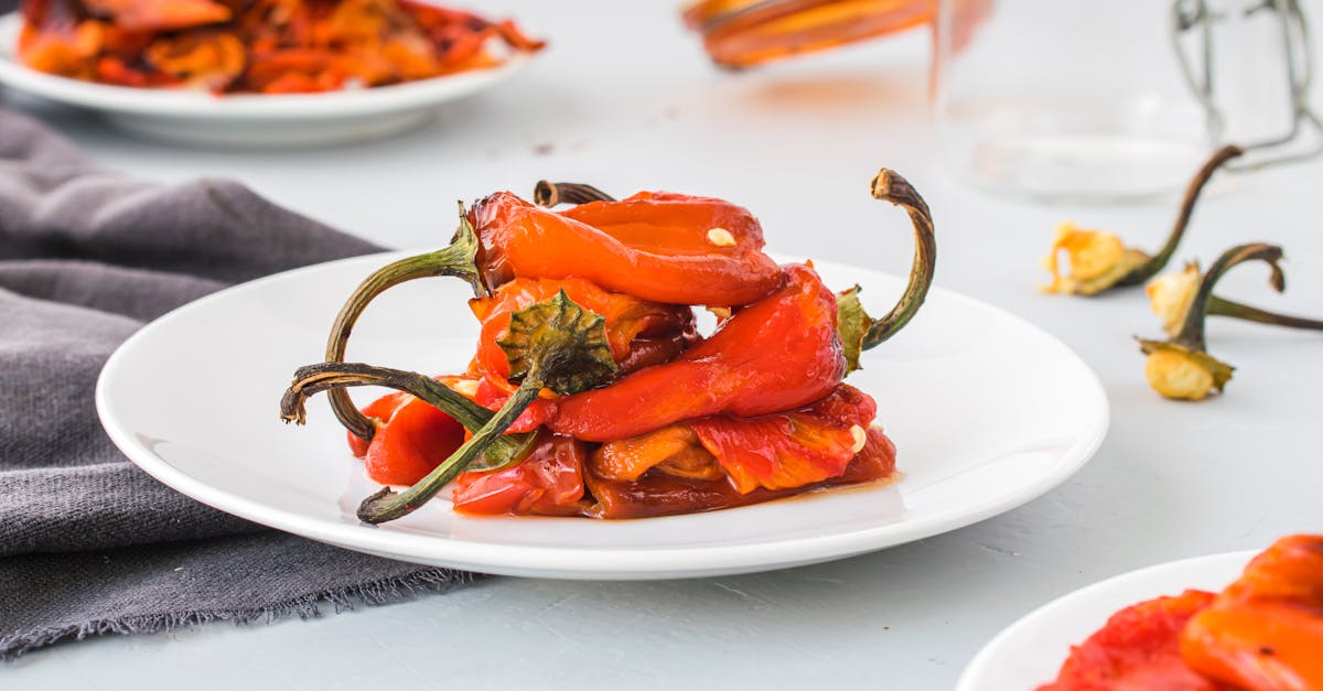 appetizing roasted red peppers served on a white plate perfect for food photography