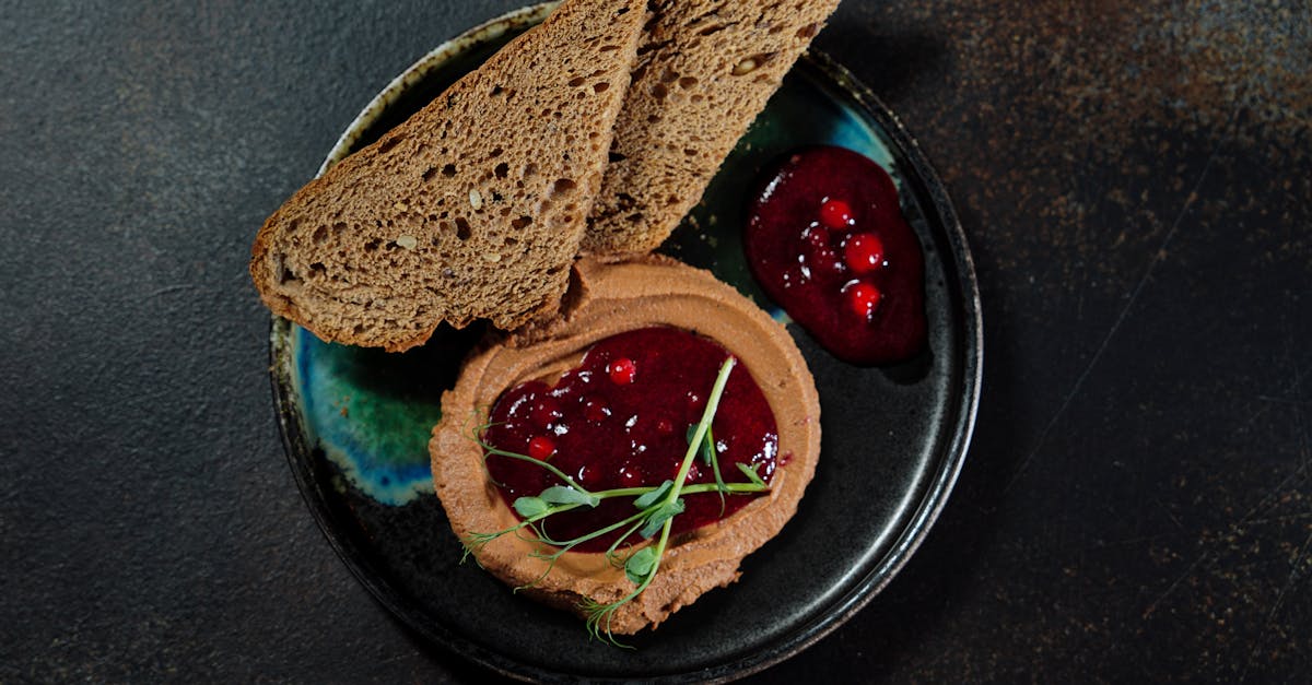 artistic still life of wholemeal bread with cranberry jam on pate perfect for breakfast or snack