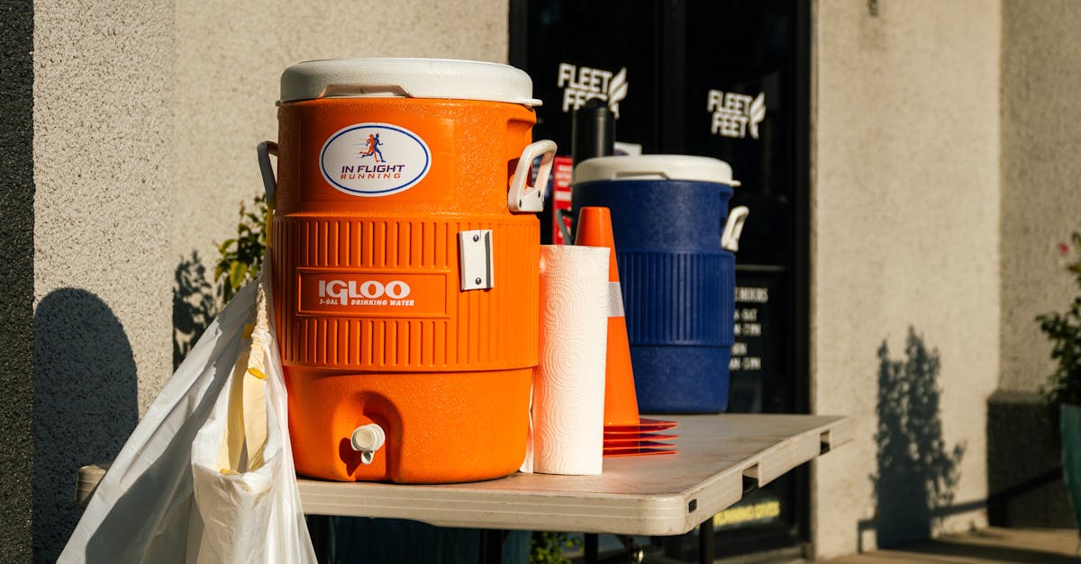 bright outdoor scene with orange and blue water coolers at fleet feet store in houston