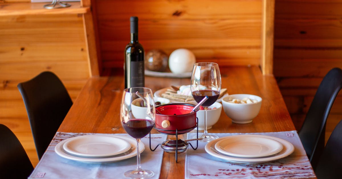 charming dining table with wine and fondue setup in serra negra brazil