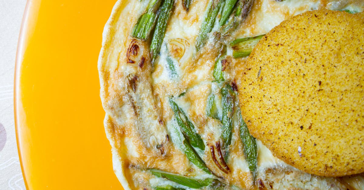 close up of a delicious asparagus frittata paired with cornbread a perfect breakfast choice 7