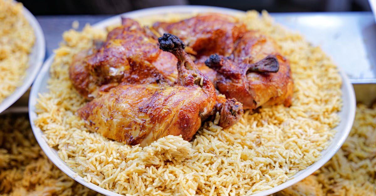 close up of a delicious chicken and rice meal served on a plate perfect for food lovers 1