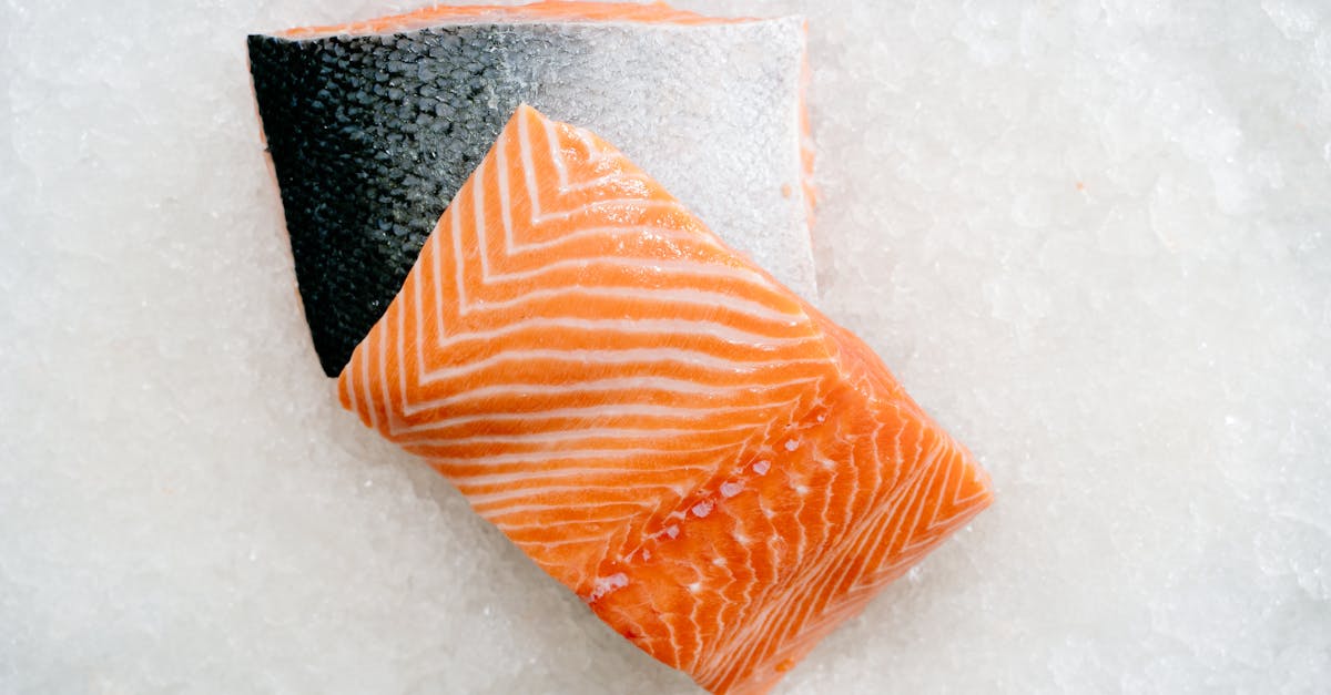 close up of a fresh raw salmon fillet on ice showcasing vibrant colors and freshness