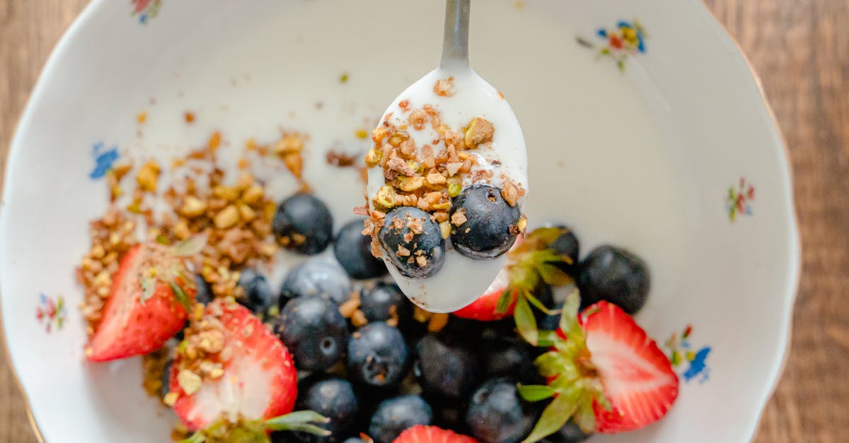 close up of a healthy yogurt bowl with fresh fruits and granola perfect for a nutritious breakfast