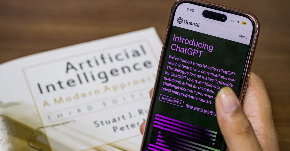 close up of a smartphone displaying chatgpt app held over ai
