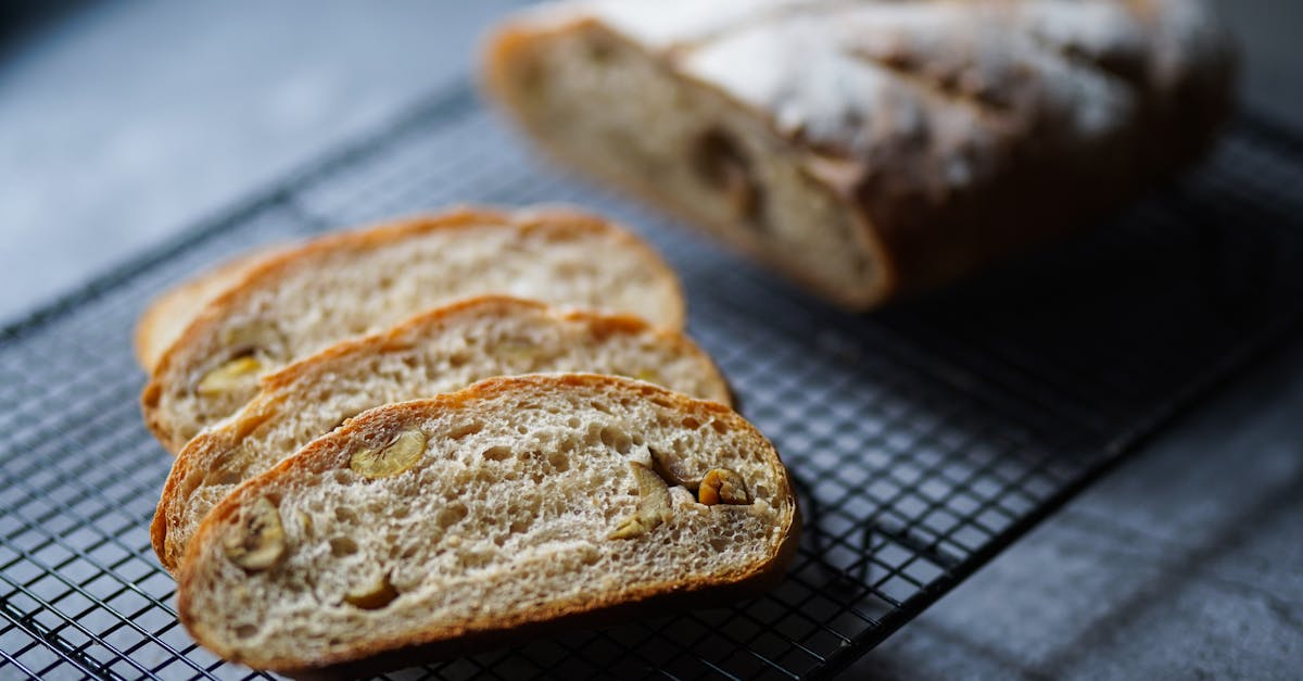 close up of fresh homemade nut bread slices on a cooling rack offering a tasty treat