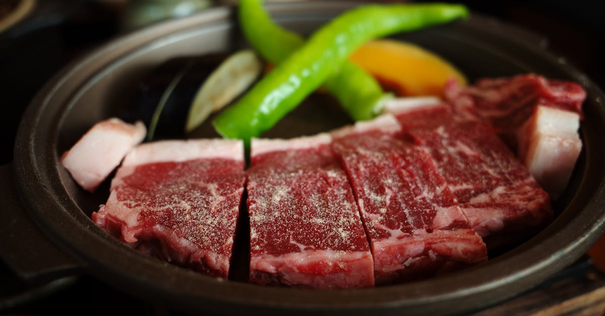 close up of marbled wagyu beef with green peppers in kyoto japan