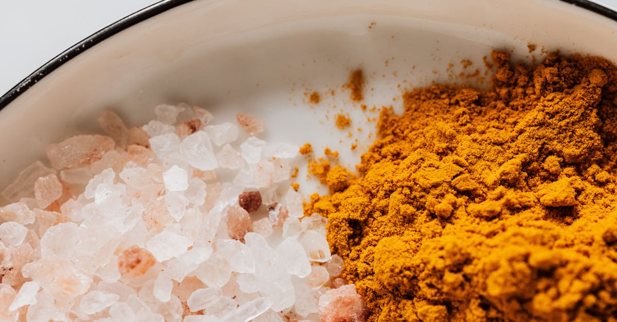 close up of pink himalayan salt and turmeric powder creating a vibrant contrast 6
