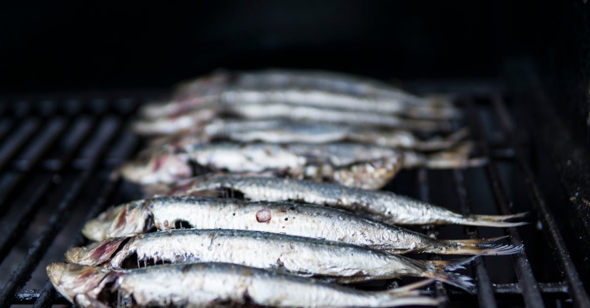 close up of sardines being grilled perfect for healthy seafood cuisine 3