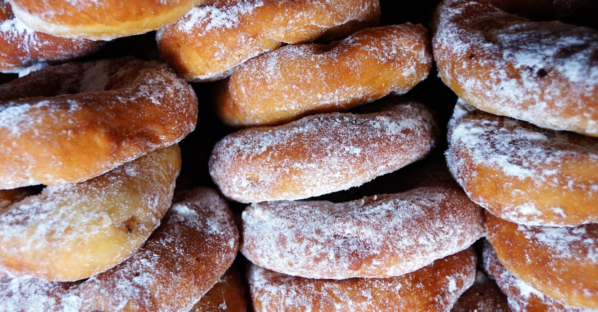 close up of traditional malaysian iced doughnuts stacked freshly baked in kota kinabalu