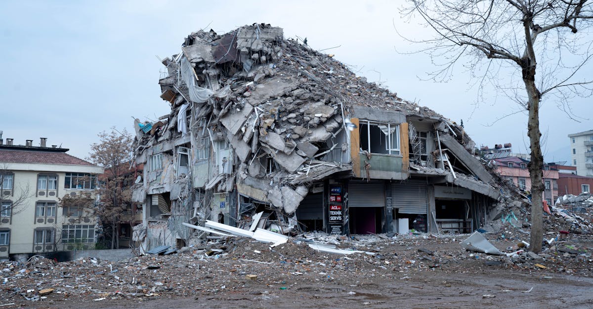 collapsed building in urban landscape showing earthquake devastation and debris 1