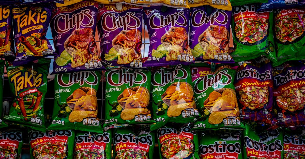 colorful assortment of snack bags displayed on a shelf showcasing popular brands and flavors