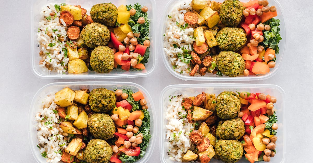 colorful meal prep containers with falafel chickpeas rice and vegetables for a healthy lifestyle 9
