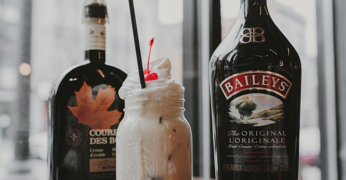 creamy baileys cocktail with cherry garnish captured in a cozy indoor setting perfect for dessert 2