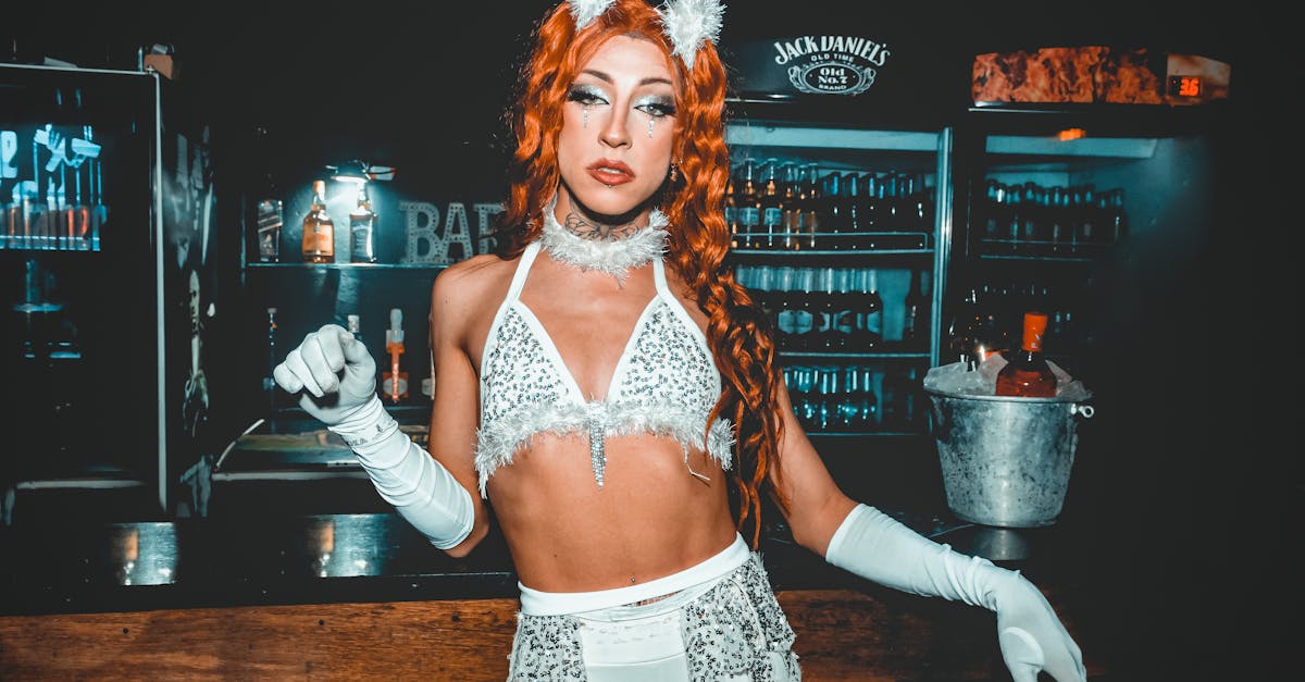 dazzling drag queen performer with red hair sparkles in a sao paulo nightclub setting