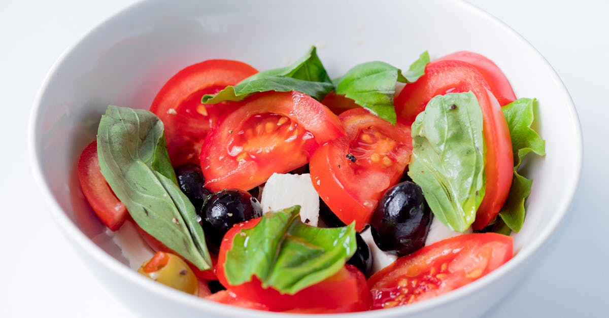 delicious and colorful caprese salad featuring fresh ingredients like tomatoes basil and olives