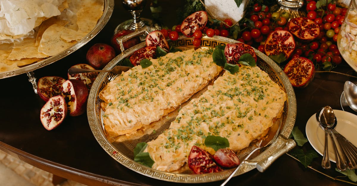 delicious buffet featuring dishes garnished with fresh pomegranates perfect for events and celebrat