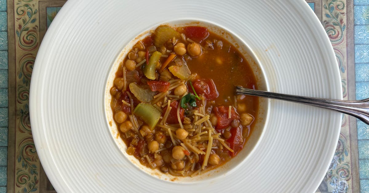 delicious chickpea soup served in a white bowl on a decorative placemat 2