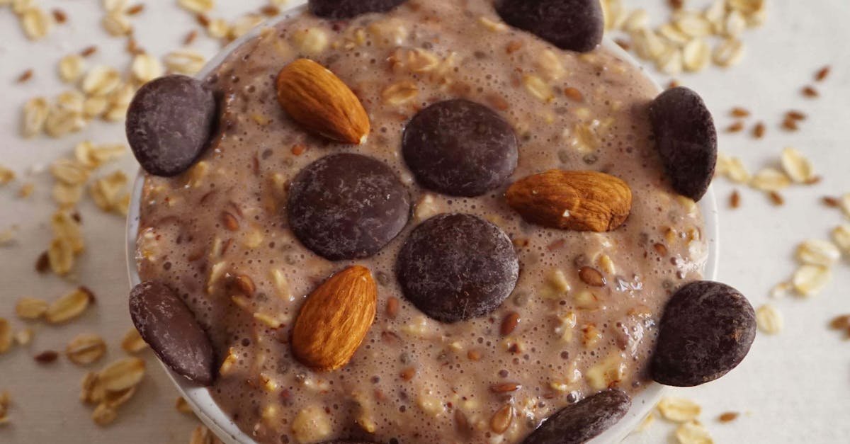 delicious chocolate almond overnight oats with a topping of dark chocolate chips and nuts perfect f 4