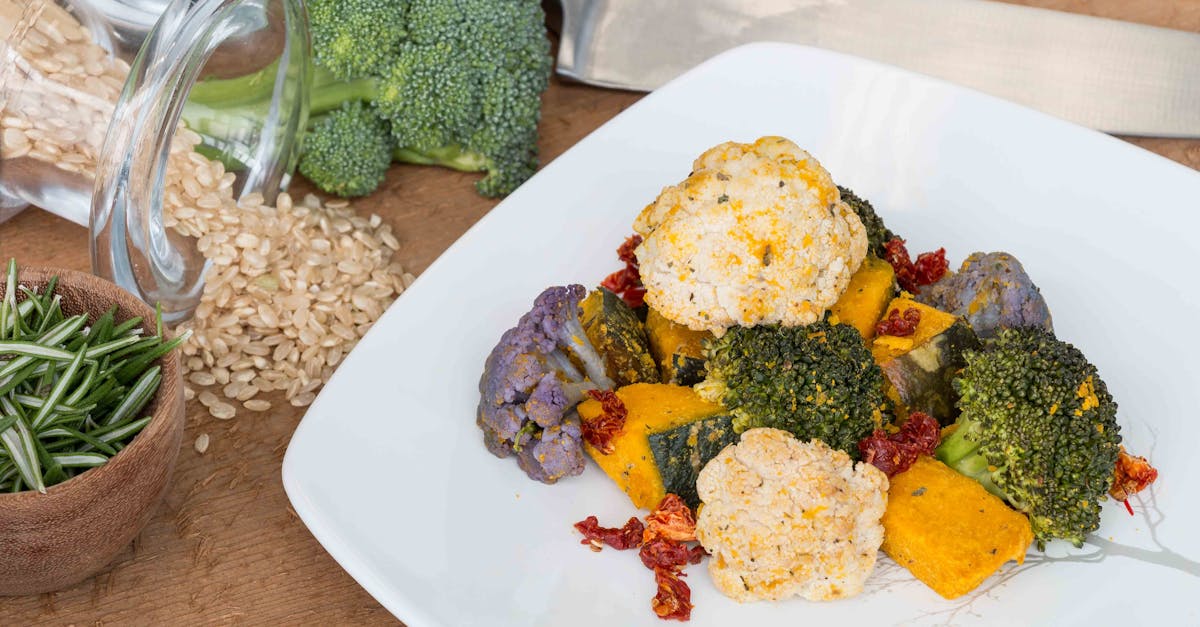 delicious cooked dish featuring broccoli cauliflower and mixed vegetables on a plate