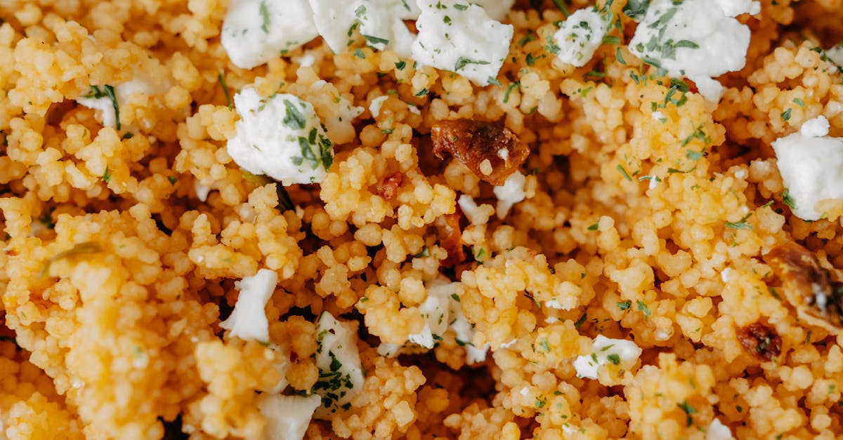 delicious couscous salad topped with cheese and herbs a perfect homemade dish featuring fresh ingre 1