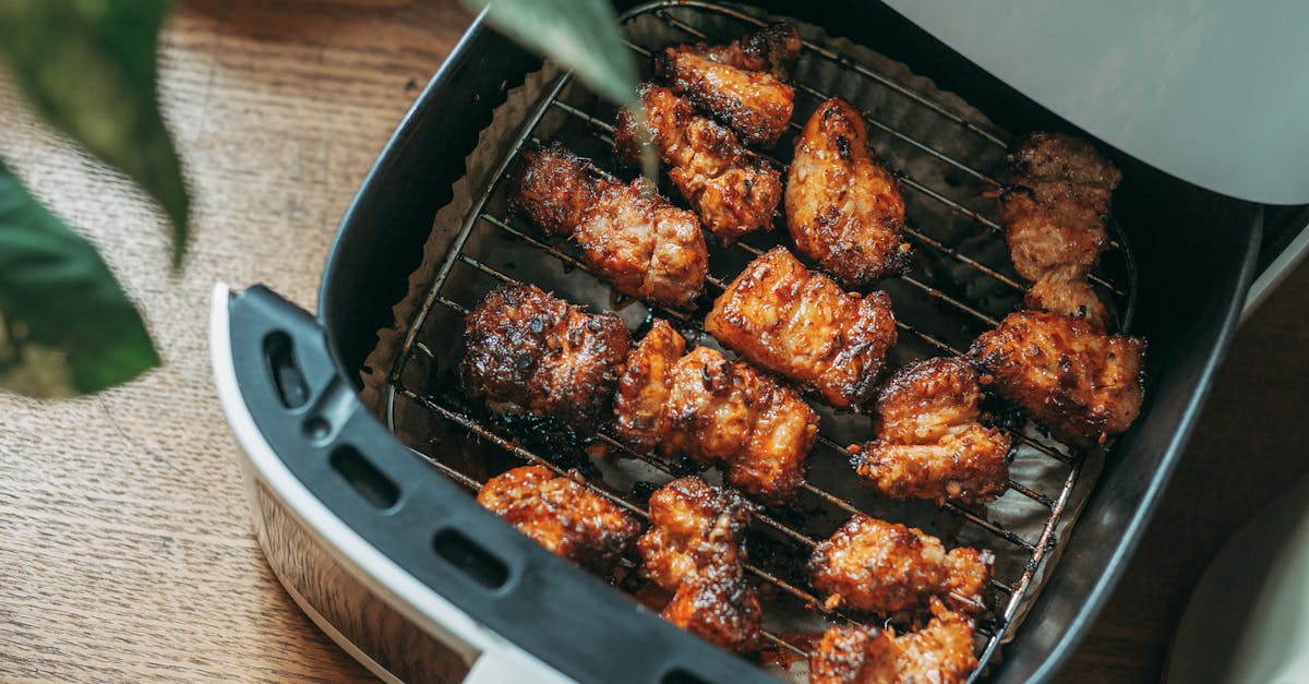 delicious crispy chicken pieces cooked perfectly in a modern air fryer ready to serve