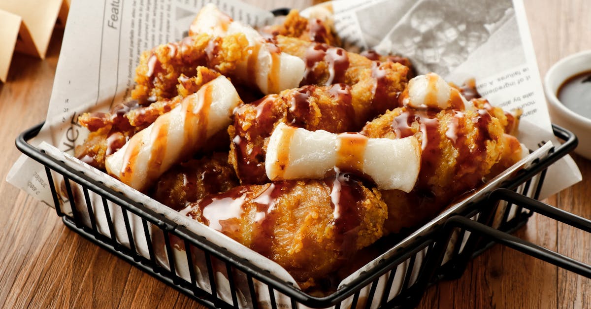 delicious crispy fried chicken with savory sauce in a stylish food presentation 2