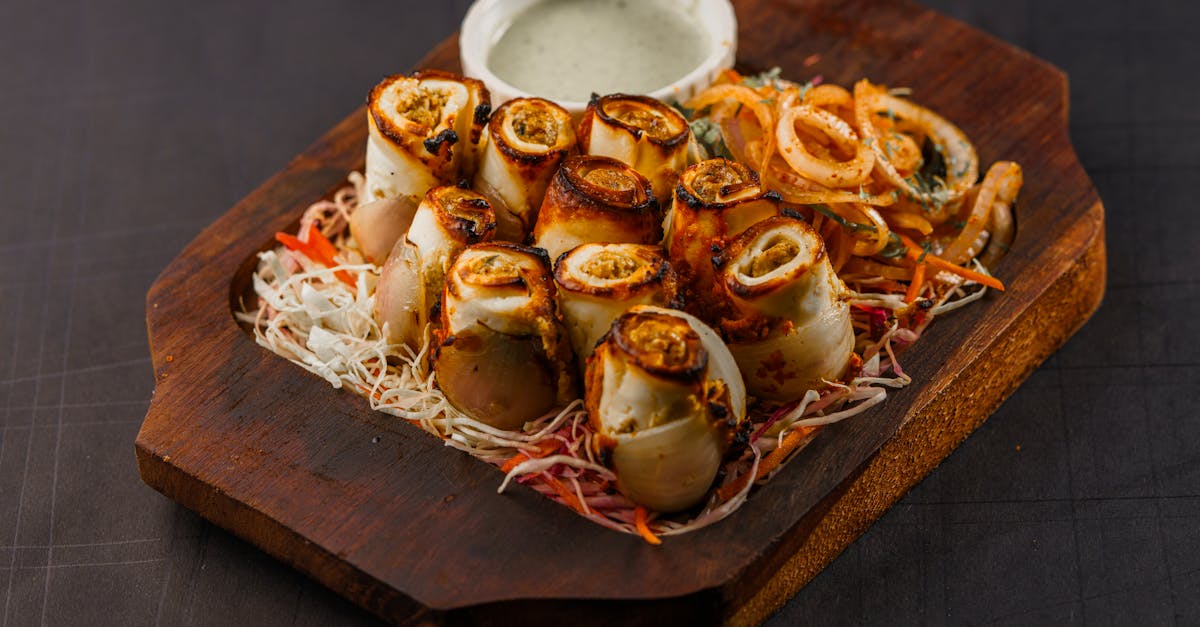 delicious grilled paneer rolls served with mixed vegetables on a wooden platter