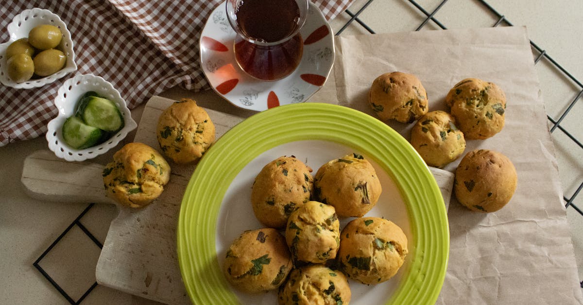 delicious herb buns served with tea olives and cucumber in a cozy setting