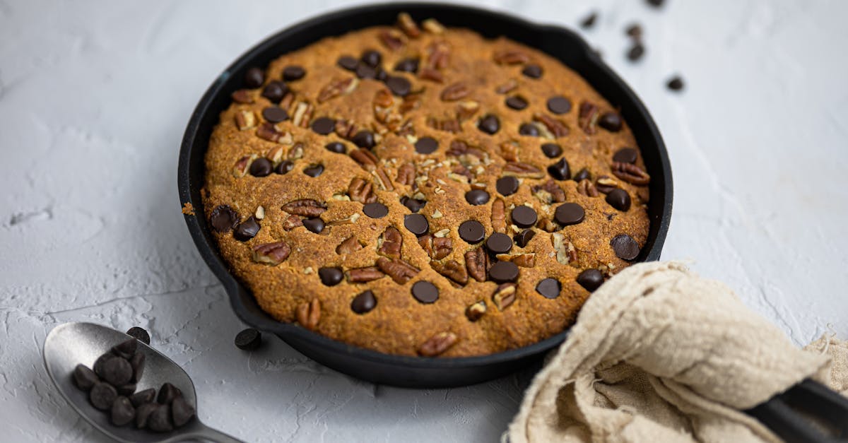 delicious homemade skillet cookie with chocolate chips and pecans perfect for dessert indulgence 3