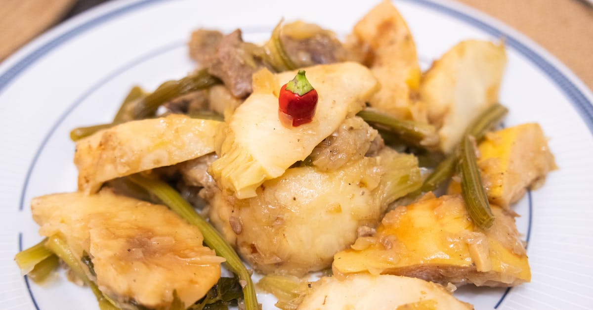 delicious izmir style artichoke dish garnished with a red pepper perfect for turkish cuisine lovers 1