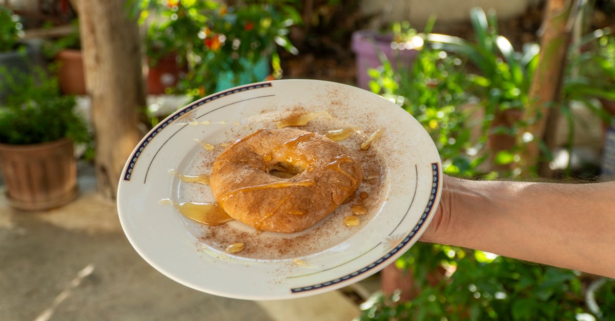 delicious sweet tiganopsomo topped with honey shot in an outdoor setting in schimatari greece